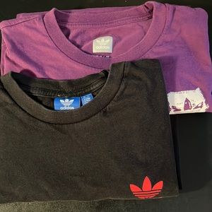 Adidas tee shirts. 1 purple and 1 black. Gently worn. Size medium.